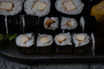 Vegan maki sushi filled with tofu