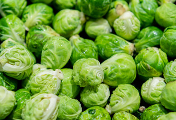 Fototapeta na wymiar Raw Brussels Sprouts in Open Container