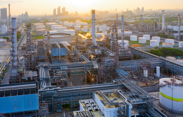 Aerial view of twilight of oil refinery ,Shot from drone of Oil refinery plant ,refinery Petrochemical plant at dusk , Bangkok, Thailand.