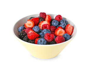 Bowl with tasty berry salad on white background