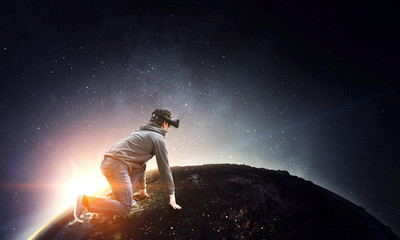 Obraz na płótnie Canvas Young man in virtual reality