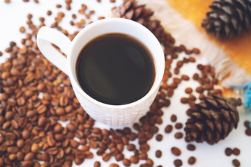 Autumn Fall Background with leaves and cup of black coffee - Autumn Card for your design, top view with copy space