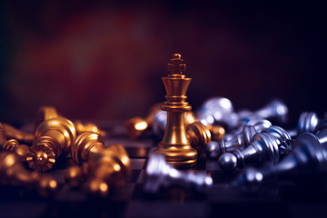 winner of chess game board, golden victory king win in successful business competition