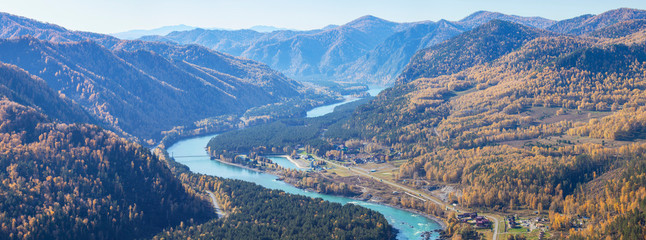 Panoramic view of the mountain valley. Over the Katun River. Autumn nature, Altai, Russia.