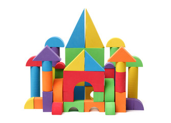 Fototapeta premium The toy castle from color blocks isolated on a white background 