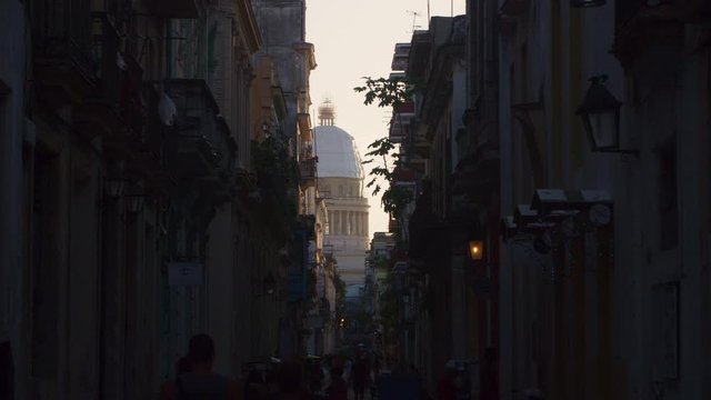 Old Havana street with city capitol in the backgroud