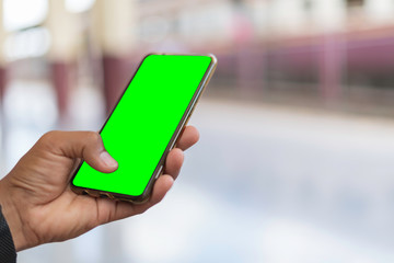 hand holding smart phone with  screen