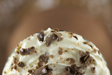 Top View Of Whipped Vanilla Ice Cream With Chocolate Flake Sprinkles Shot With A Macro Lens
