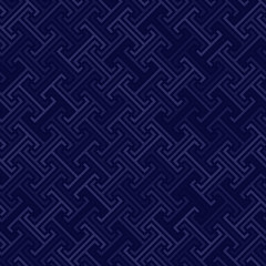 continuous diagonal stylized greek fret repeated motif. vector seamless technology pattern. simple repetitive dark blue background. geometric shapes. textile paint. fabric swatch. wrapping paper