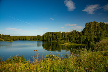 Landscape with lake and blue sky