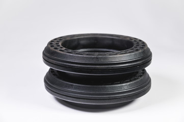 A pair of new thrust bearings absorber car on a gray background. The concept of new car parts and car service