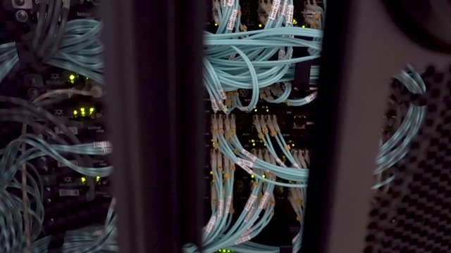 View through the open door of the server rack. Telecommunication Server with Flashing Lights