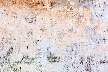 Texture of a concrete wall with cracks and scratches which can be used as a background