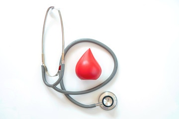 Top view shot of arrangement equipment medical background concept.Red blood & stethoscope