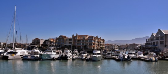 Fototapeta na wymiar Landscape with the Harbour Island Marina in Gordons Bay