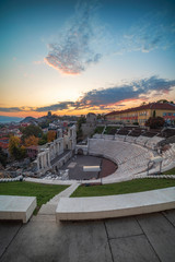 Bulgaria, Plovdiv city. Warm sunset panorama over Roman Amphitheatre in the oldest town in Europe