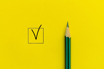 the simple minimalism concept of the pen and the checkbox on the color background
