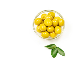 Canned olives in a bowl on the white background, isolated. 