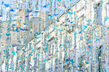 City decorations before the holiday in the form of colorful butterflies
