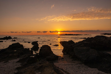 Fototapeta na wymiar Japanese rocky sunset