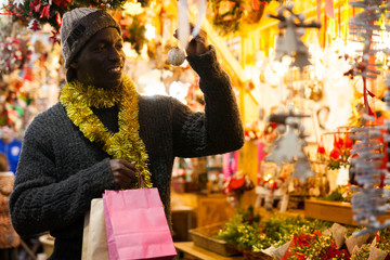 Man looking for New Year decorations