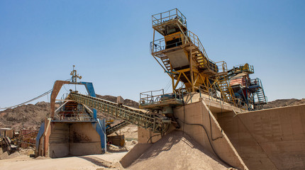 heavy machinery industrial equipment for digging in desert quarry place  