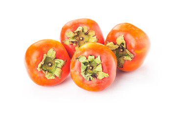Delicious fresh persimmon fruit on wooden table.