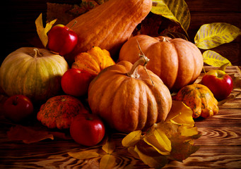 Autumn still life with pumpkins, apples