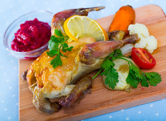 Roasted partridge with cranberry sauce