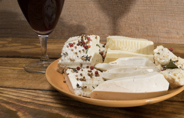 cheese with spices and wine - 297059114