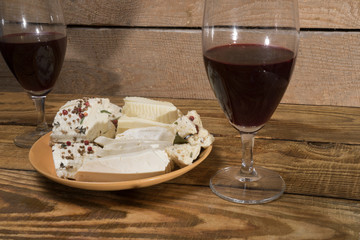 cheese with spices and wine - 297059129