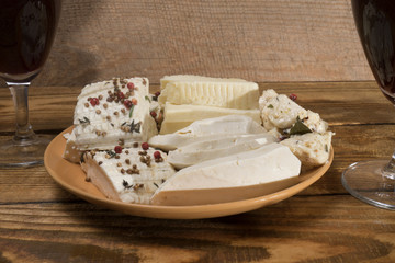 cheese with spices and wine - 297059147