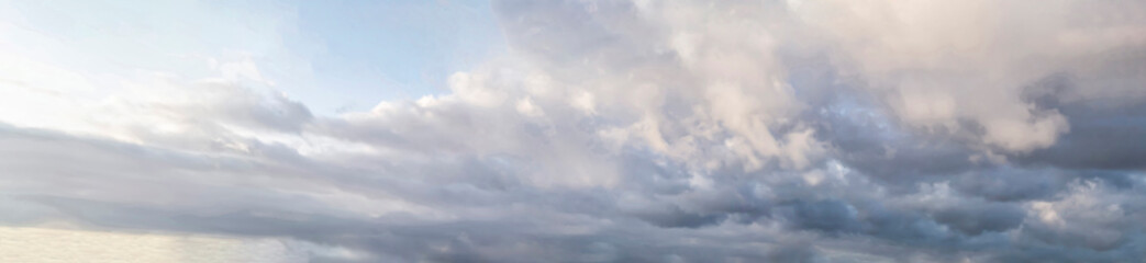 Obraz premium Magical air sky at sunrise. Panorama of clouds on a frosty morning.