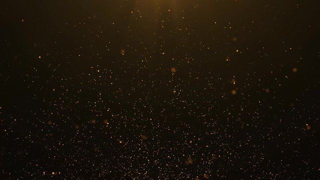 Beautiful Gold Floating Dust Particles with Lens flare light special effect on Black Background in Slow Motion. 4k Ultra HD