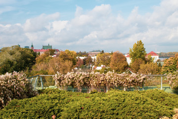 Fototapeta na wymiar Panoramic autumn view of the old city of the Polish capital of Warsaw. City landscape on a sunny day.