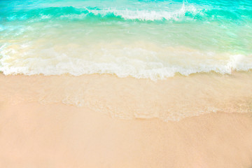 aqua sea water surface waves on white sandy beaches and clouds, natural blue sky. summer vacations at Samed island Rayong Thailand.