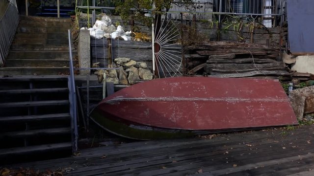 an old abandoned boat lying near the pier