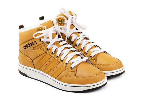 Yellow Adidas winter shoes Stock Photo | Adobe Stock