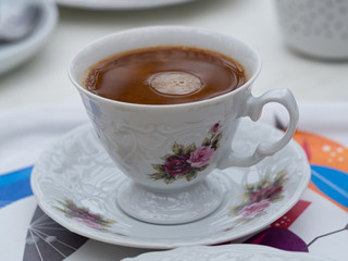 cup of coffee and on the table
