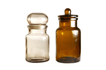 Glass bottles with stopper isolated on white background. Vintage brown empty glass bottles..