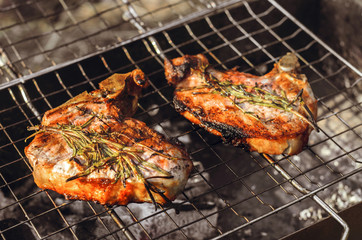 Steaks cooking on grill for summer outdoor party. Food background with barbecue party, front view