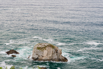 Fototapeta na wymiar Gueirua beach. Cantabrian sea coast cliffs in Cudilleros, Asturias