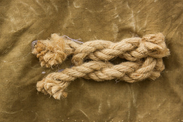 knot on khaki background