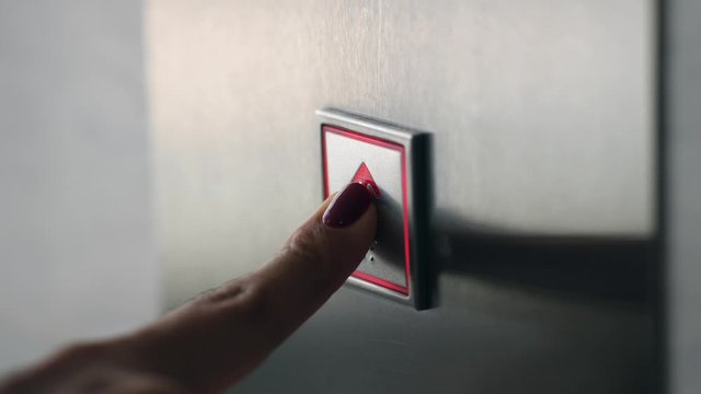 Finger Pressing Elevator Button Up in Office Center or Hotel. Progress Future Startup Concept Footage. 4K Slowmotion.