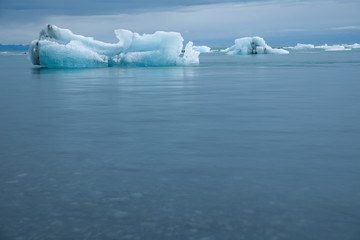 Icebergs in the J&ouml;kuls&aacute;rl&oacute;n glacier lake in Iceland in winter. Photographed at cloud.