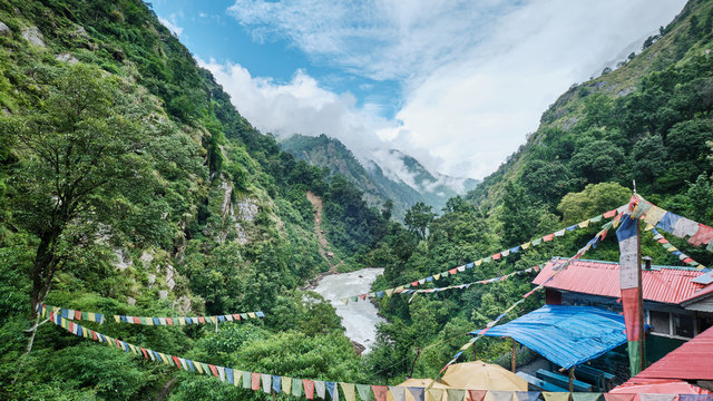 Hamlet of Landslide overlooking Langtang Khola - Powered by Adobe