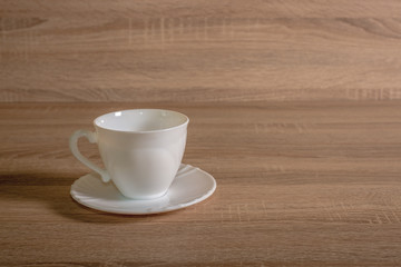 empty cup and saucer on the table