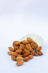 almonds isolated on white background close up. 