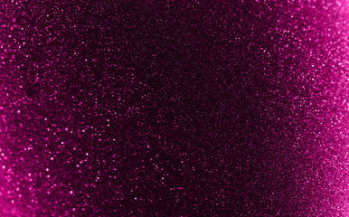 Blurred texture of glitter's paper. Festive background.