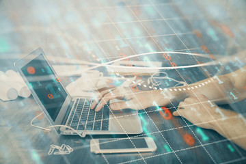 Double exposure of forex chart with man working on computer on background. Concept of market analysis.
